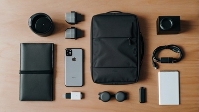"Best Android Accessories For Travel including power banks, USB-C cables, wireless earbuds case, Android phone stand, universal travel adapter, compact Bluetooth keyboard, and travel organizer displayed in a flat lay setup for modern travelers"